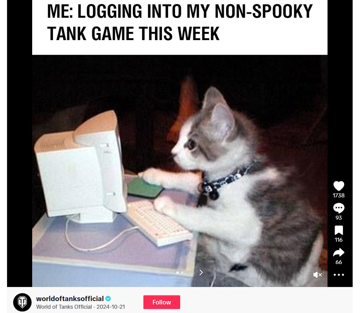 A meme of a cat sitting at a toy computer with the caption: "ME: LOGGING INTO MY NON-SPOOKY TANK GAME THIS WEEK."